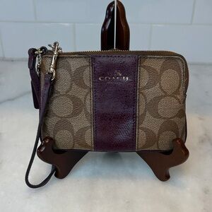 Coach signature logo coated canvas striped wristlet